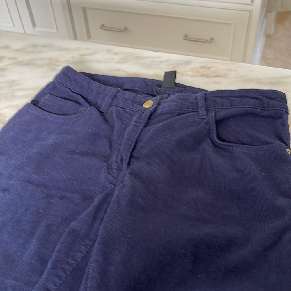 H&M navy corduroy  size 6 pants with gold hardware ; zippers on bottom.